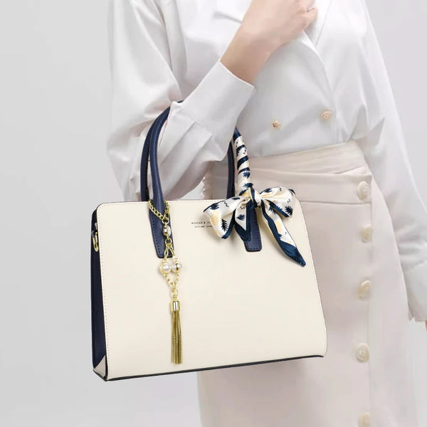 Aidrani  Elegant and minimalist women's handbag made of high-quality cowhide with tassels and ribbons